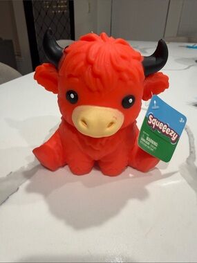 Orange Cow squeeezy Toy